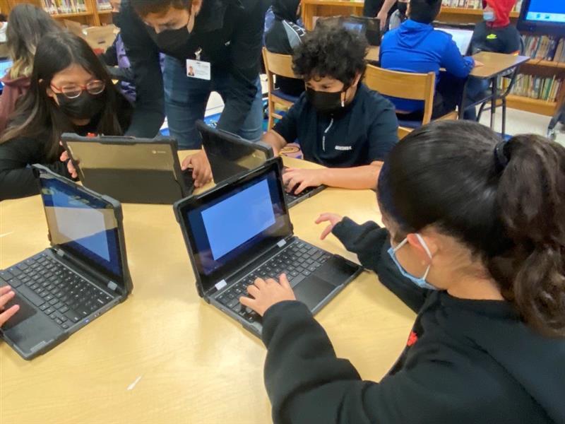 Students use Chromebooks