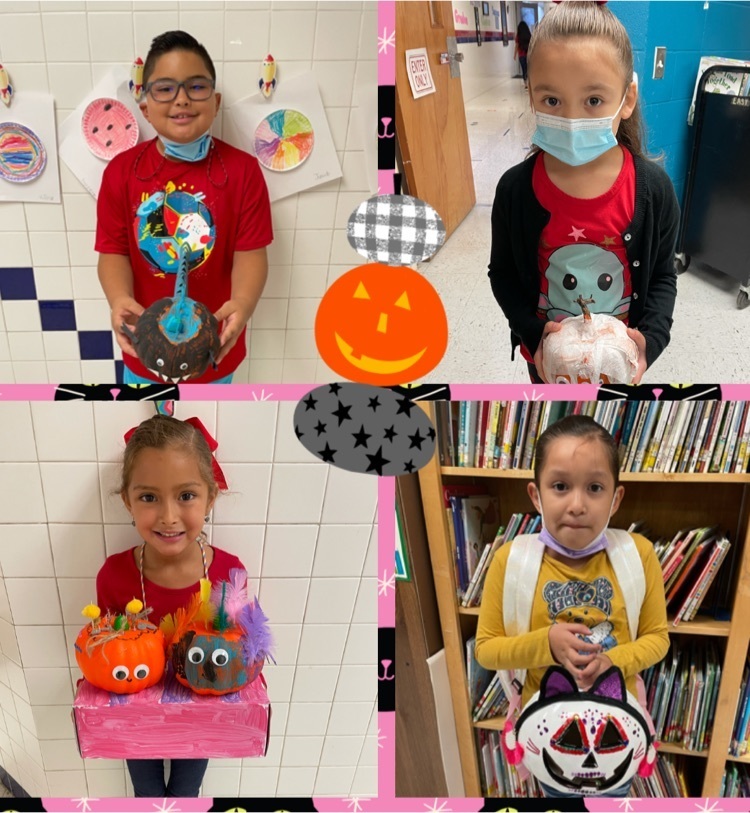 students with pumpkins